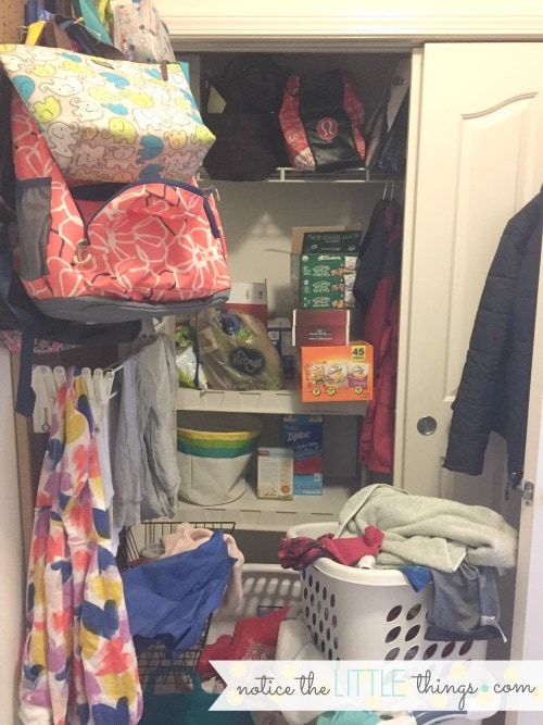 messy laundry room before renovation