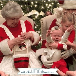 crying on santa's lap